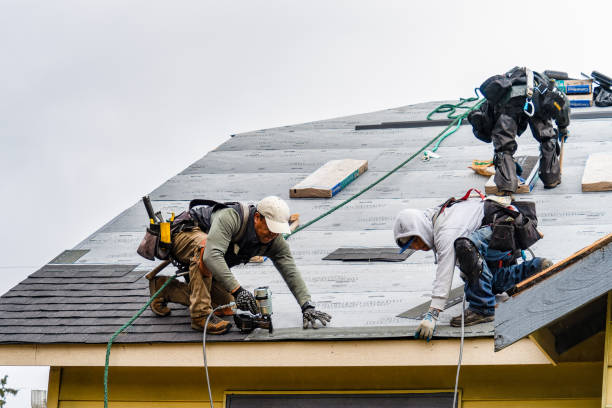 Professional Emergency Roof Repair technician working in Salem, MA